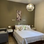 Bedroom with bassinet